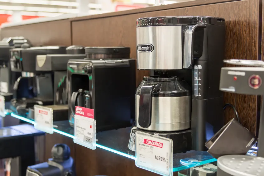 Coffee makers on shelf for sale